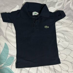 Lacoste size S polo.